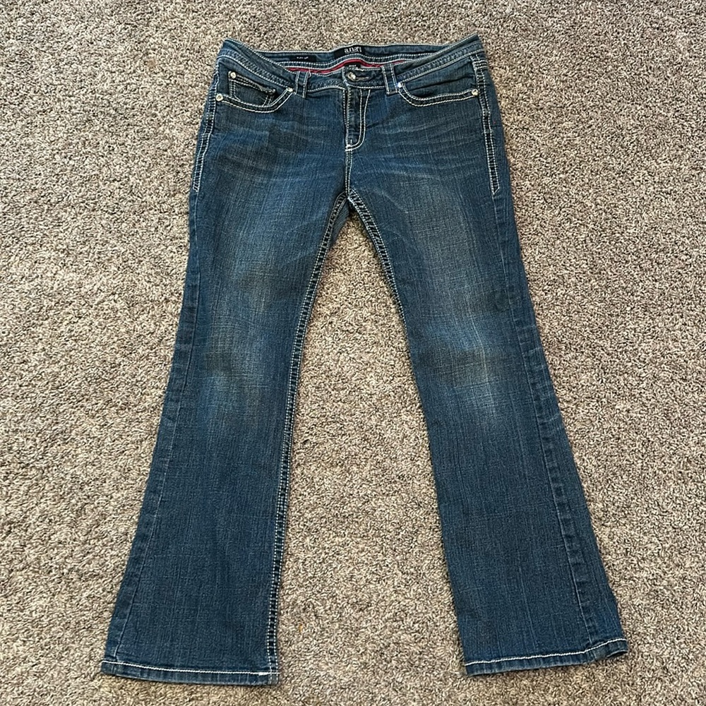 A.N.A women’s denim blue jeans boot cut size 31/12p /Designs on back pockets